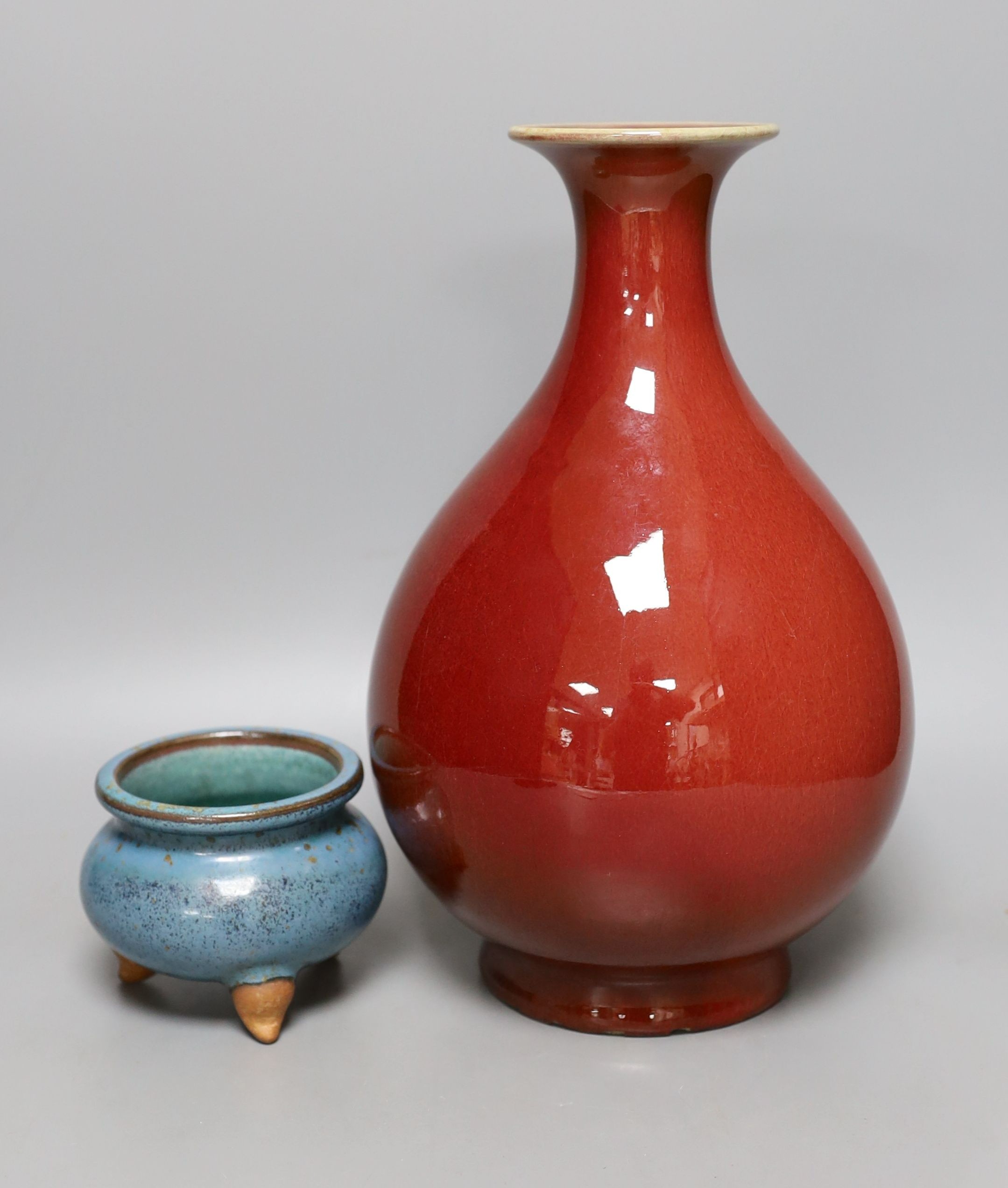 A Chinese Sang de boef vase, 30cm high, and a blue glazed censer